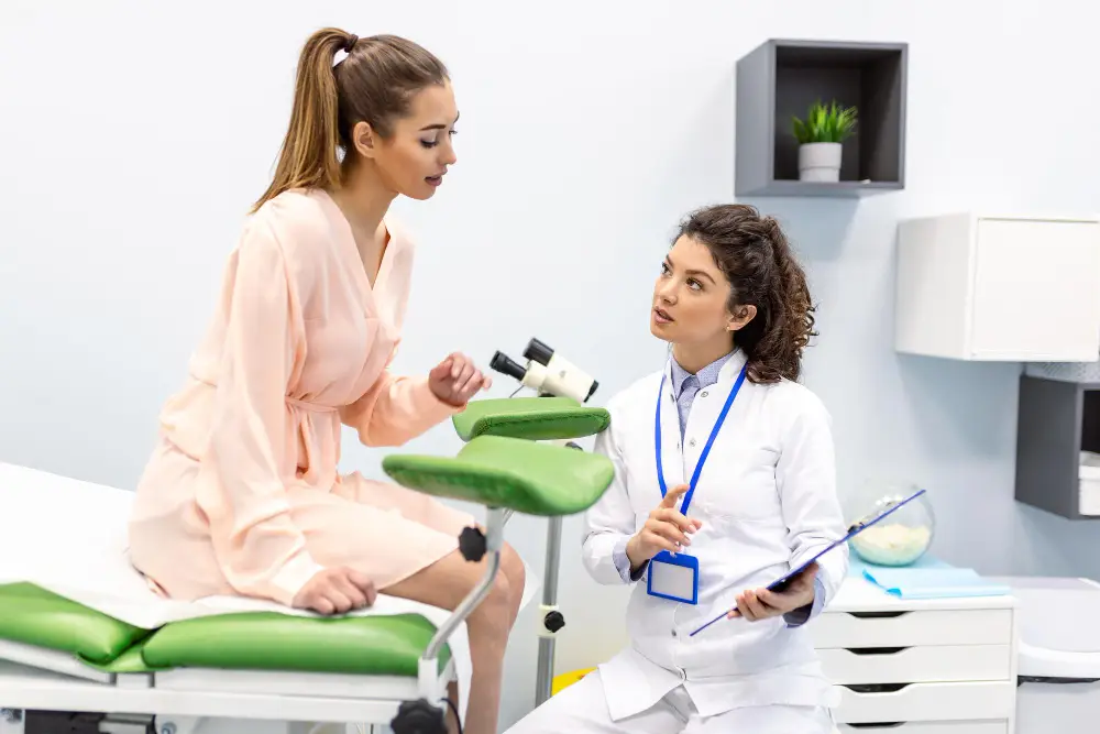 Private gynaecology consultation with a young woman before hymenoplasty
